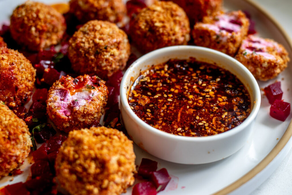 Crispy Goat Cheese & Pickled Beet Balls with Chili Crisp Honey